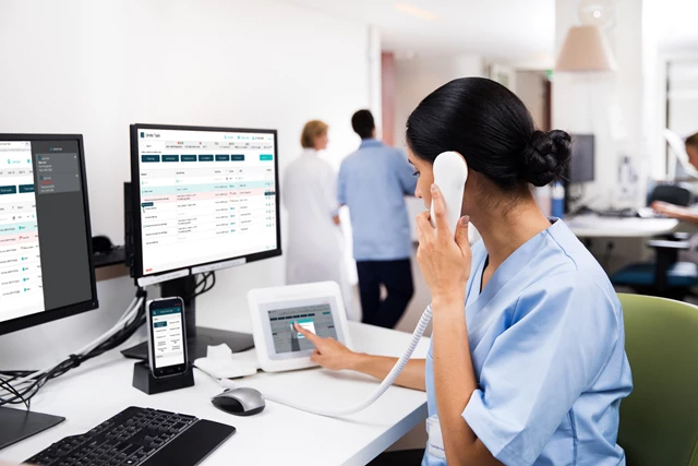Nurse using Ascom device