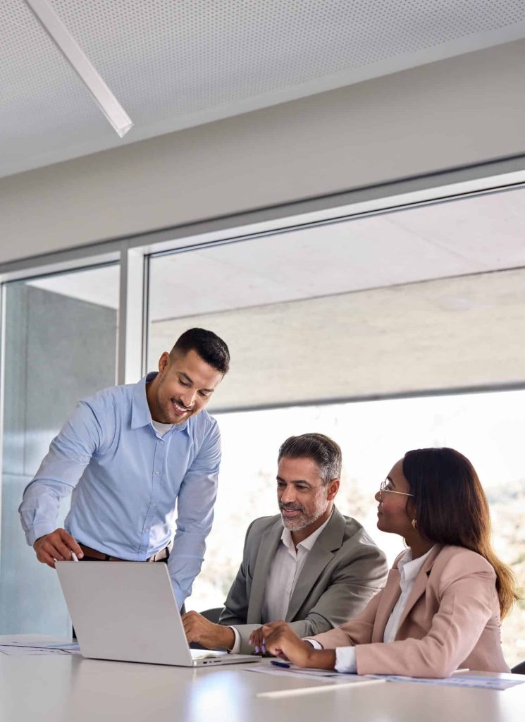 Business man explaining colleagues how to make use of Citymesh fixed internet connection